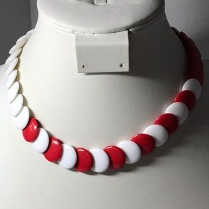 Red/ white round beaded necklace, gold tone closure with magnet.